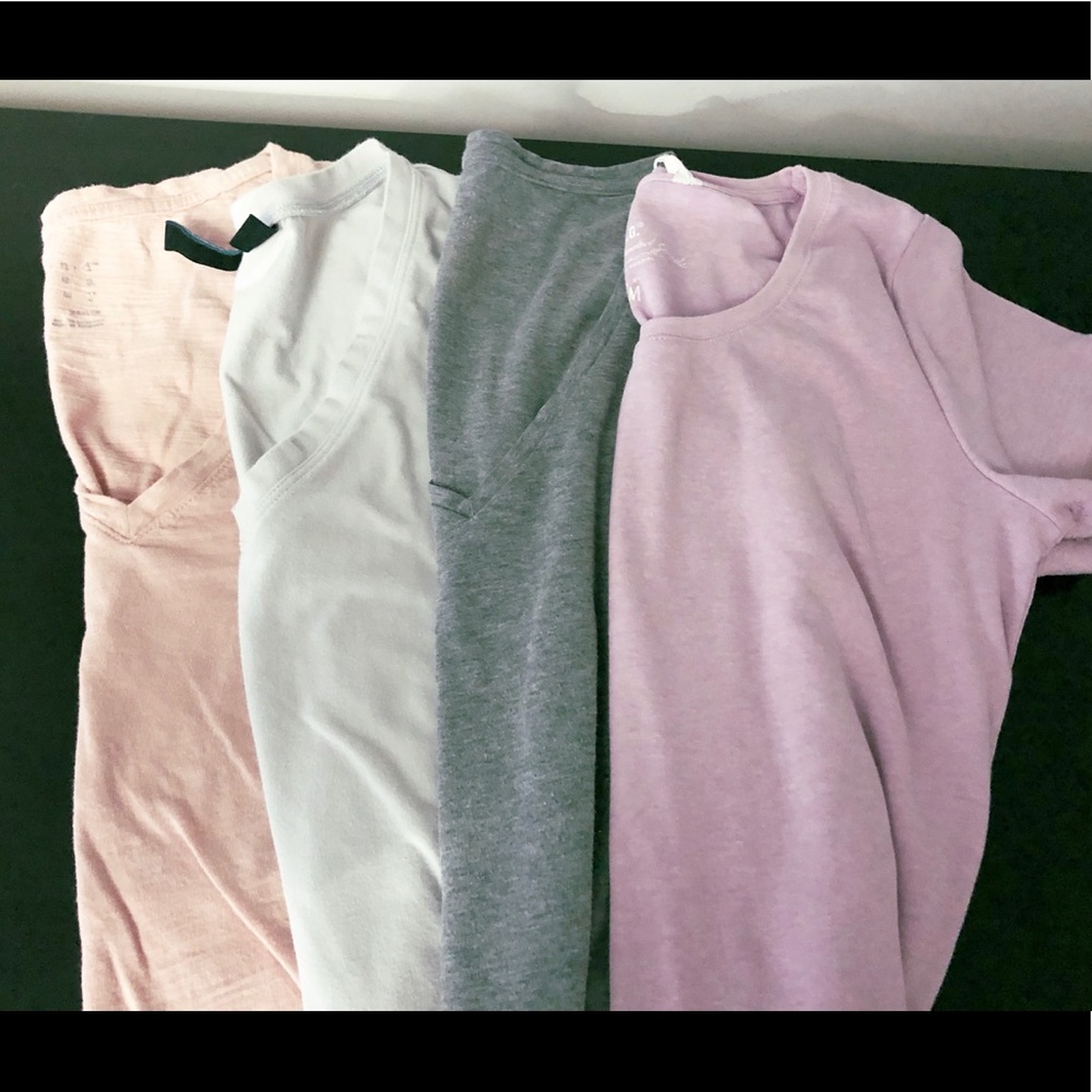 4 t-shirt set. 3 medium 1 small. 3 v-neck one crew